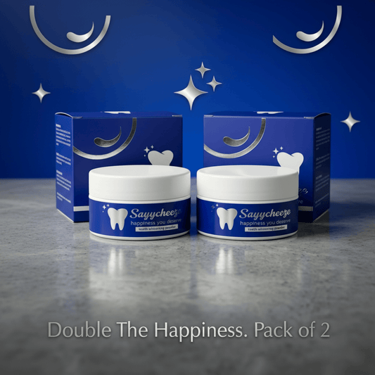 Pack of 2 Sayycheeze Teeth Whitening Powder jars with blue packaging and white lids on a marble surface